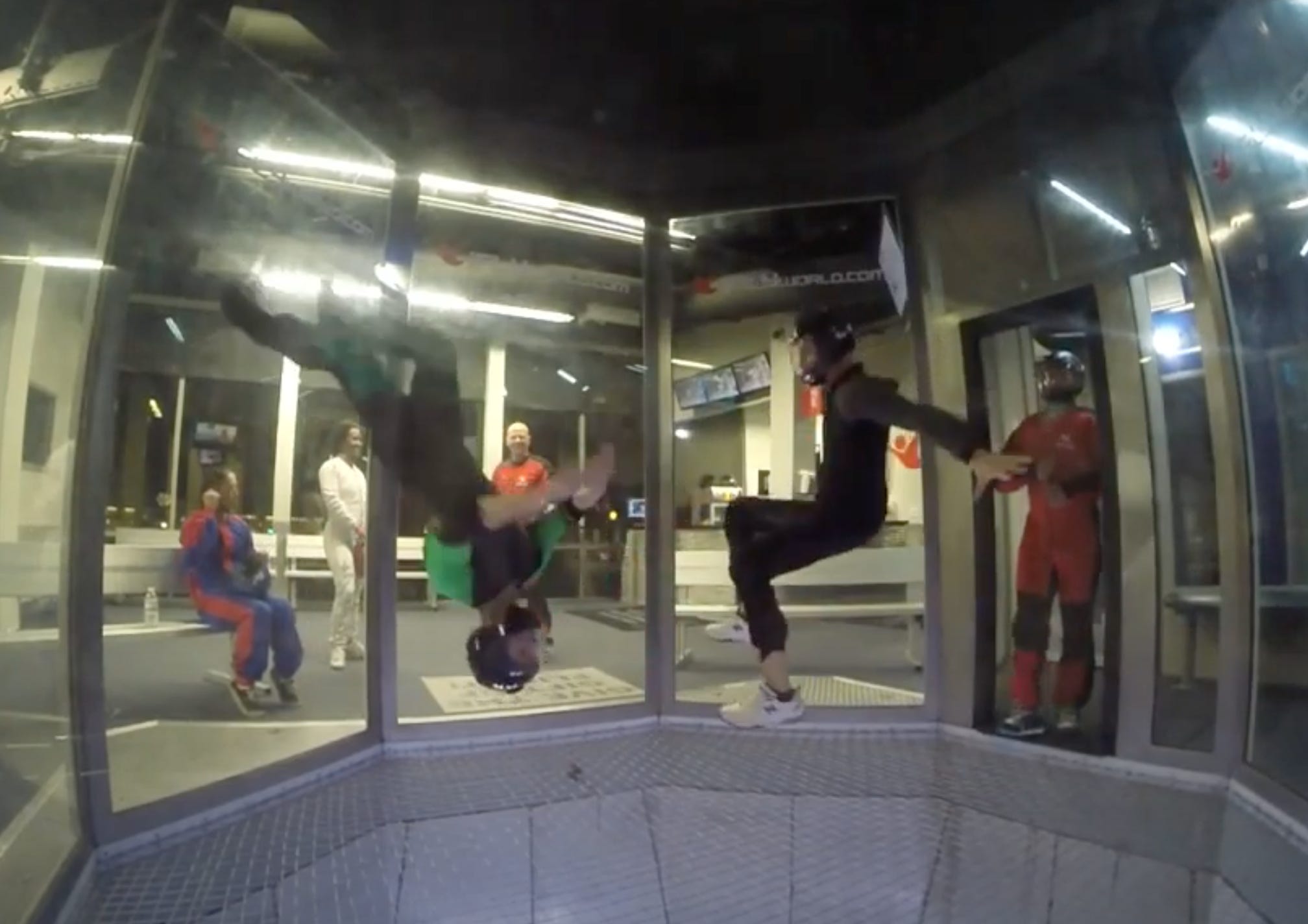 Here's me (in green) slamming my heels against the wall as I botch a front flip to my head